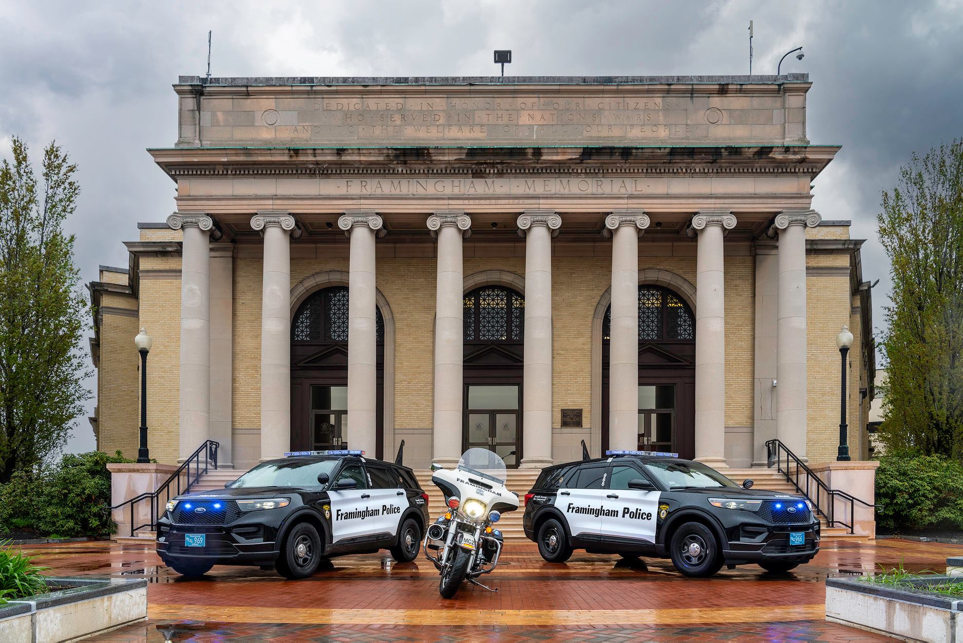 Memorial Building with Police cars in the front