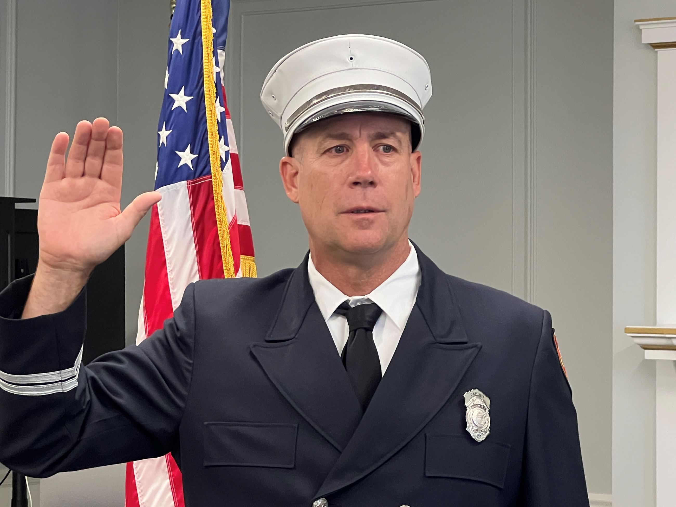 Photo of McDonald being sworn in as fire captain July 22 2024